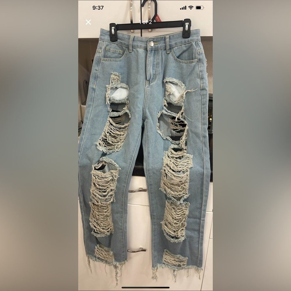 Distressed Light Blue Jeans